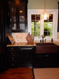 Custom built hood and kitchen cabinets.